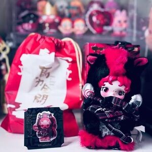 Adorable Pink and Black Plush Toy